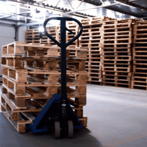 A large warehouse with pallets stacked high.